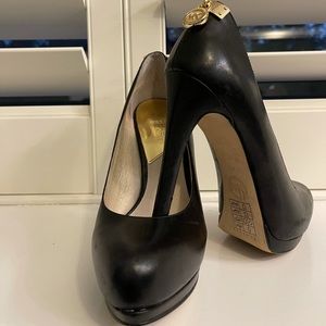Michael Kors black platform pump with gold detail size 7